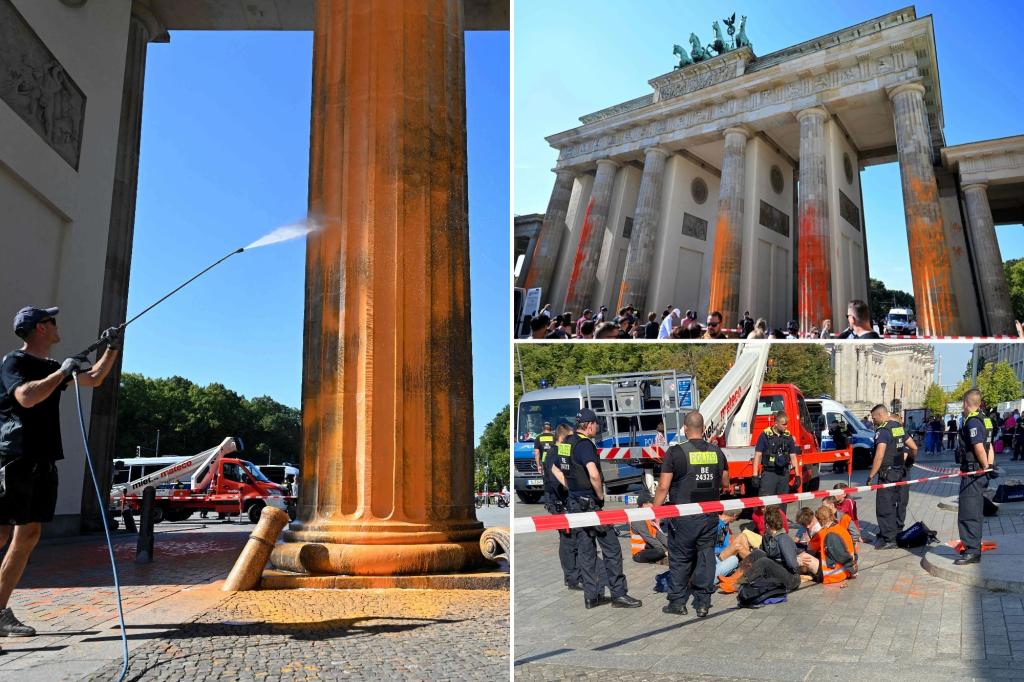 Climate activists spray Berlinâs Brandenburg Gate with orange paint